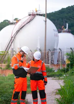 Engineers inspecting LPG storage spheres