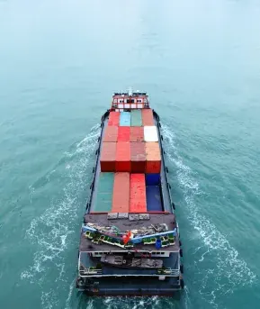 Loaded barge under way