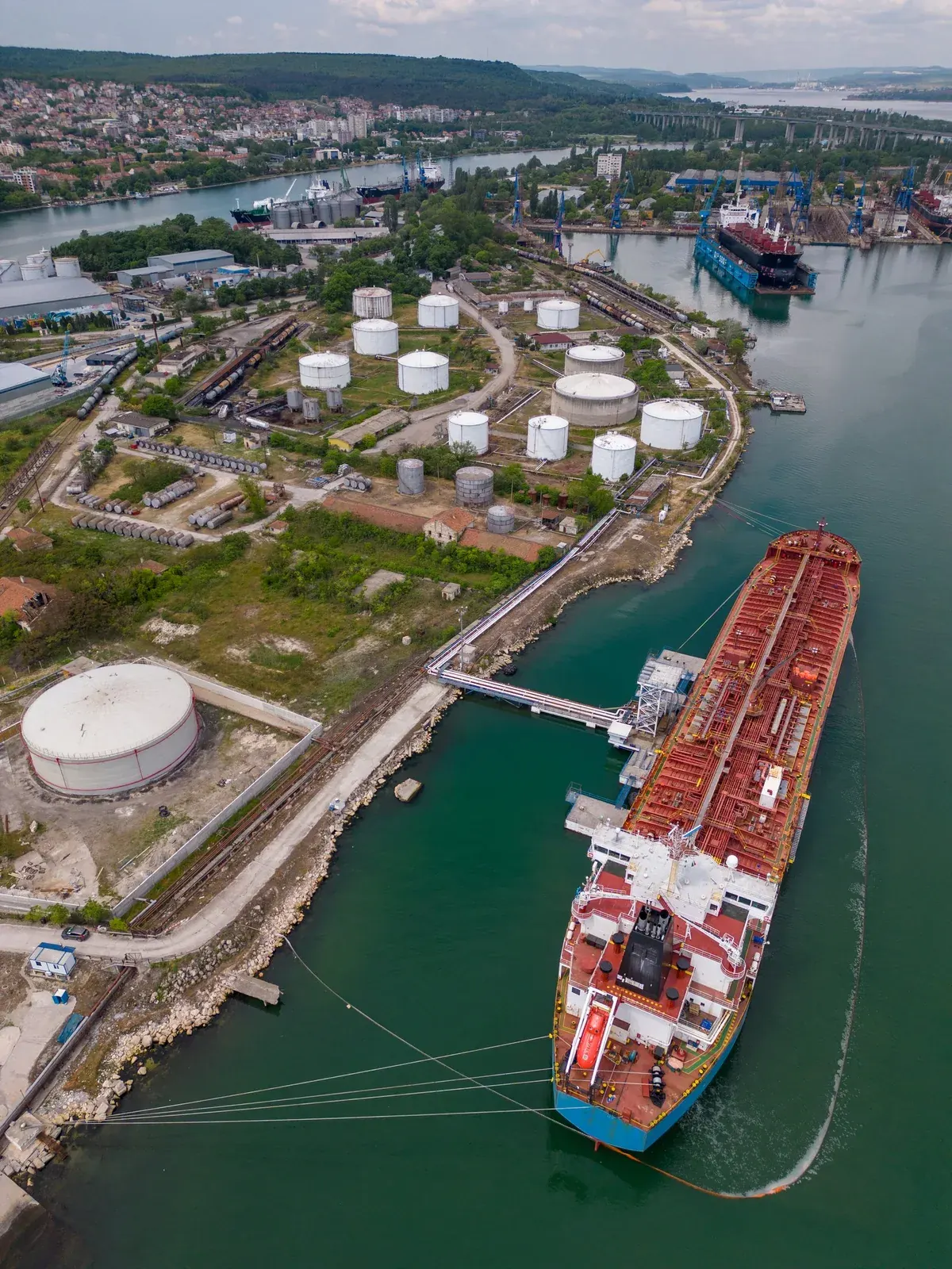 Tanker discharging at a tank-farm terminal