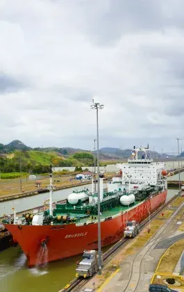 Product tanker transiting a canal lock
