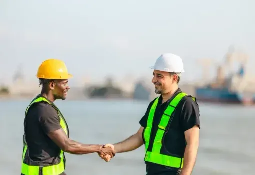 Counterparties shaking hands at the waterfront