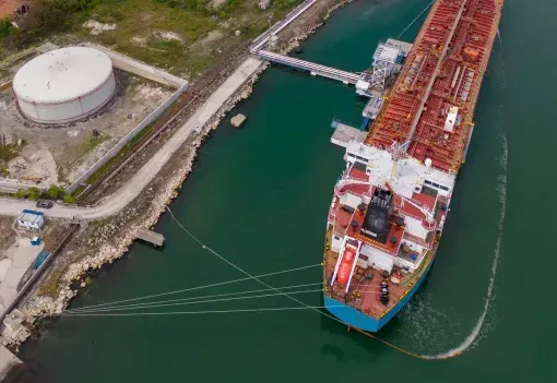 Tanker discharging at a tank-farm terminal